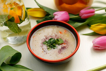 Horseradish soup with vegetables.
A colorful appetizing dish. Culinary photography, food styling.

