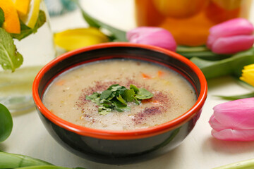 Horseradish soup with vegetables.
A colorful appetizing dish. Culinary photography, food styling.
