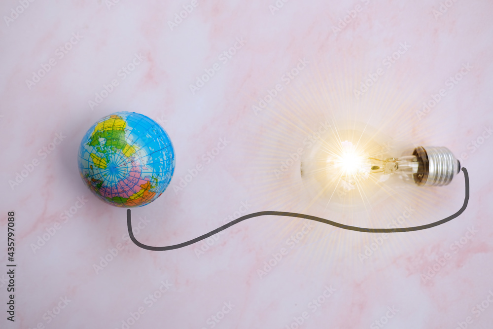 Poster globe and light bulb connected with wire on white background. business idea concept. globe feeds ele