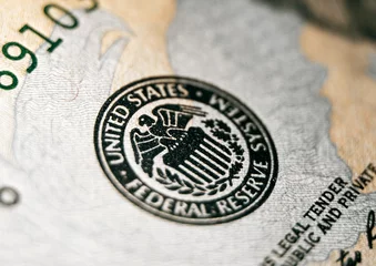 Foto op Aluminium Close up macro shot of federal reserve stamp on the US dollar bill © AlexGo