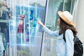 futuristic technology,smart retail online concept.Woman try to use  hologram display with virtual...