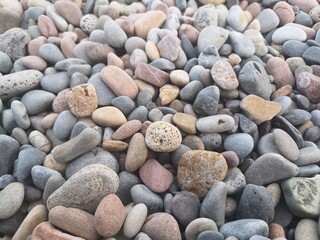 Beach pebbles wallpaper by the mediterranean coast