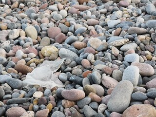 Beach pebbles wallpaper by the mediterranean coast
