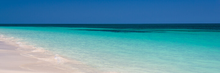 Fototapeta na wymiar Perfect tropical beach and lagoon, panoramic summer background