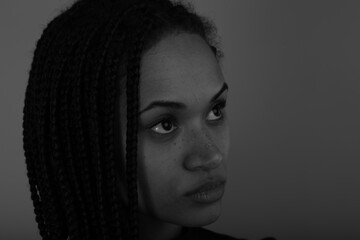 Black and white portrait of beautiful curly woman