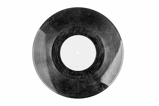 Old fashioned damaged scratched vinyl record, black and white hdr, object isolated on white background, cut out, empty blank label. Classic vintage retro vinyl disc with many deep scratches, top view