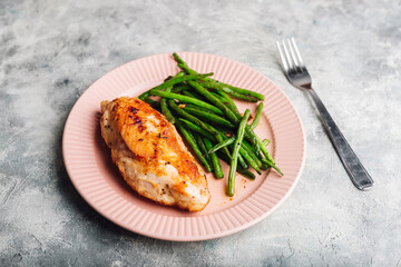 Baked Chicken Breast with Green Beans on Plate