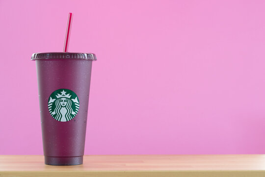 Bangkok, Thailand - March 21, 2021: Close Up A Purple Starbucks Coffee Cup On The Table With Pink Background