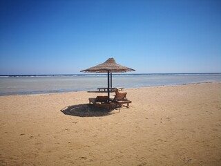 a umbrella on the beach