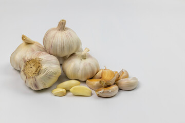 Garlics on white background.