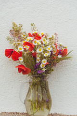 Beautiful Summer Bouquet of Wild  Flowers-Daisies and Poppy Flowers in a Glass Vase 