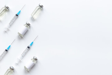 Medicine bottle for injection. Coronavirus vaccine ampoules with syringe