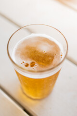 Typical Americano Glass with cold beer at a bar in Brazil