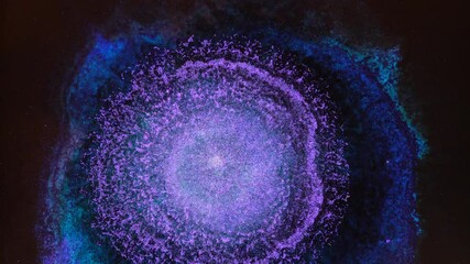 Neon purple dark blue colors liquid ink. Colorful amazing magic abstract background. Explosion in galaxy cluster. Eye of God, Helix Nebula, Big Bang, Universe