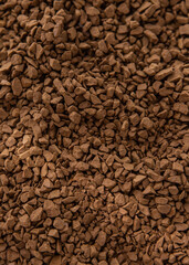 Instant coffee granules texture background. Top view. Close up. Macro photography.