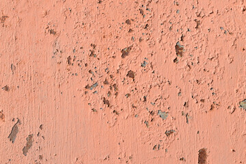 pink.peach scuffed paint. old coating
