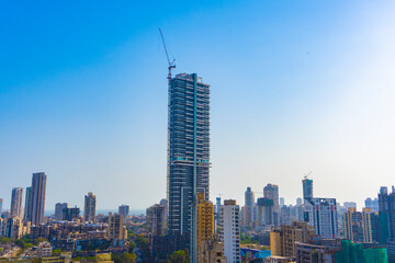 Mumbai, Maharashtra - April 5 2021: HDR image of Antilia Building shot against the sky with other...