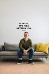 Happy freelancer looking away at office lobby