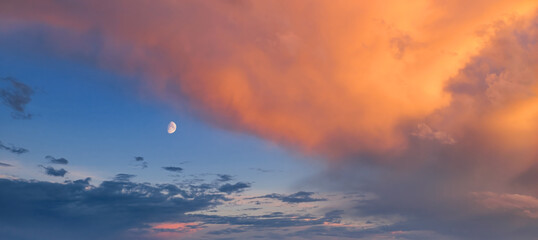 Sky background with clouds and moon. Moon with clouds and sunlight © vvlink