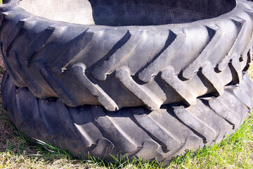 Old tires from a heavy truck. Truck tires are stacked.