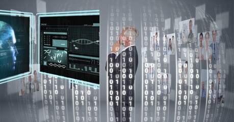 Composition of binary coding over businessman looking at screen with medical digital data