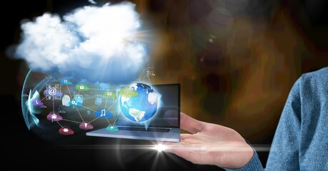 Composition of digital online icons and cloud floating over businesswoman's hand