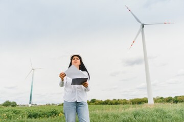Female Engineer in a Wind Turbines Farm