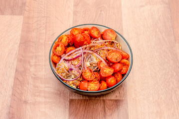 Hawaiian-style bowl with bluefin tuna and lots of cherry tomatoes with red onion