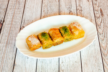 Baklava cakes with pistachio, coconut and almond