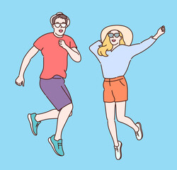 Summer, vacation, relaxation, concept. Young happy couple ready for summer vacation, jumps with happiness