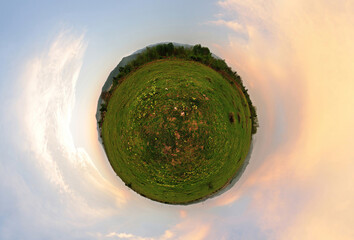 Stereographic panoramic projection of a filed in sunset light. 360 degree panorama. - 435845872