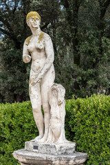 Ruined marble sculpture of  a naked woman decorating a garden in Rome