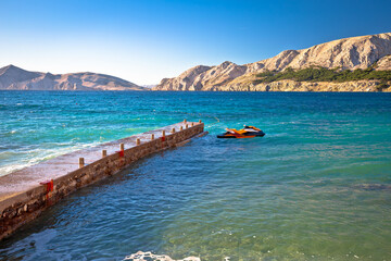 Jet ski scooter on turquoise beach in Baska