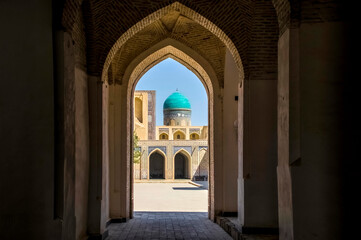 Fototapeta na wymiar Kalyan Mosque at Poi Kalyan religious complex in Bukhara, Uzbekistan. Kalyan Mosque UNESCO World Heritage