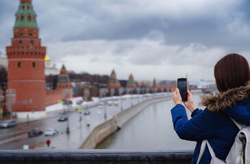 Asian tourist in travel vacations in winter Moscow