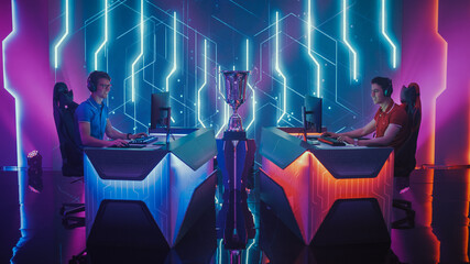 Two Professional Esport Gamers Competition in a Video Game on a Championship Arena, Both Playing...
