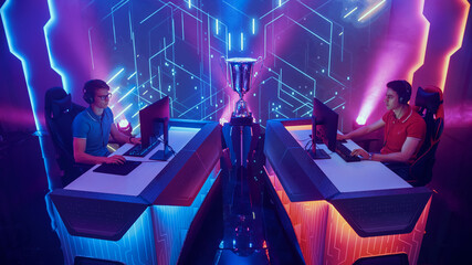 Two Professional Esport Gamers Actively Compete in Video Game Playing on Championship Event with...