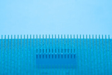 Close-up of a part of a microprocessor in soft focus under high magnification. Details of a...