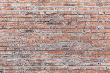 Vintage brown stone brick wall pattern and background seamless