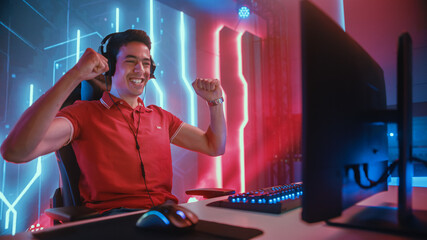 Professional eSports Gamer Playing in Computer Video Games, Happily and Cheerfully Celebrates...