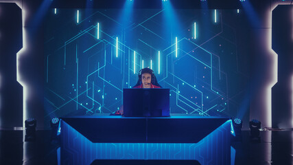 Professional eSports Gamer Playing in Computer Video Games, Happily and Cheerfully Celebrates...