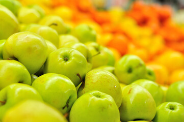 Golden apples close up in market