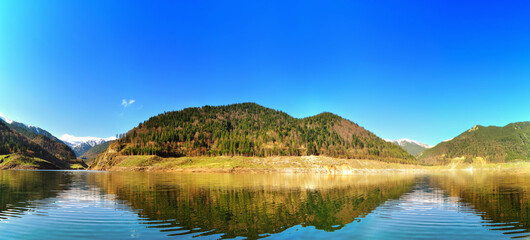 Mountains and lake reflection.