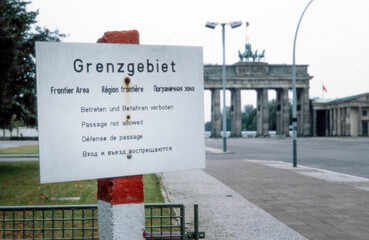 Warning sign at Brandenburger Tor and Berlin wall in 1984. Western sector. Germany. Cold war. Grenzgebiet. Sperrgebiet. © A