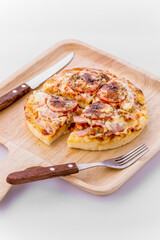 Mini pizza with sausage and cheese