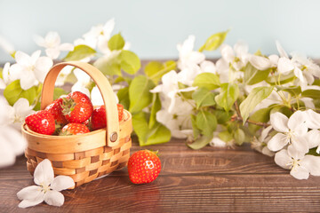 Fresh ripe strawberries in a tiny basket