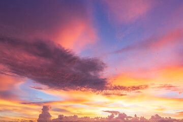 Fototapeta premium blue bright and orange yellow dramatic sunset sky in countryside texture background.