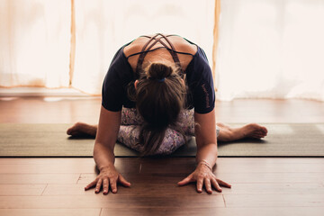 Fototapeta na wymiar woman meditating in yoga lotus position