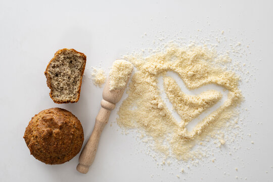 Gluten Free Baked Goods, Muffins On Almond Flour With Nuts On A White Background, Love Heart Symbol, Keto Food, Top View