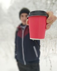 person with a cup